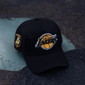 New Era Los Angeles Lakers 9FORTY Black Trucker Adjustable Cap